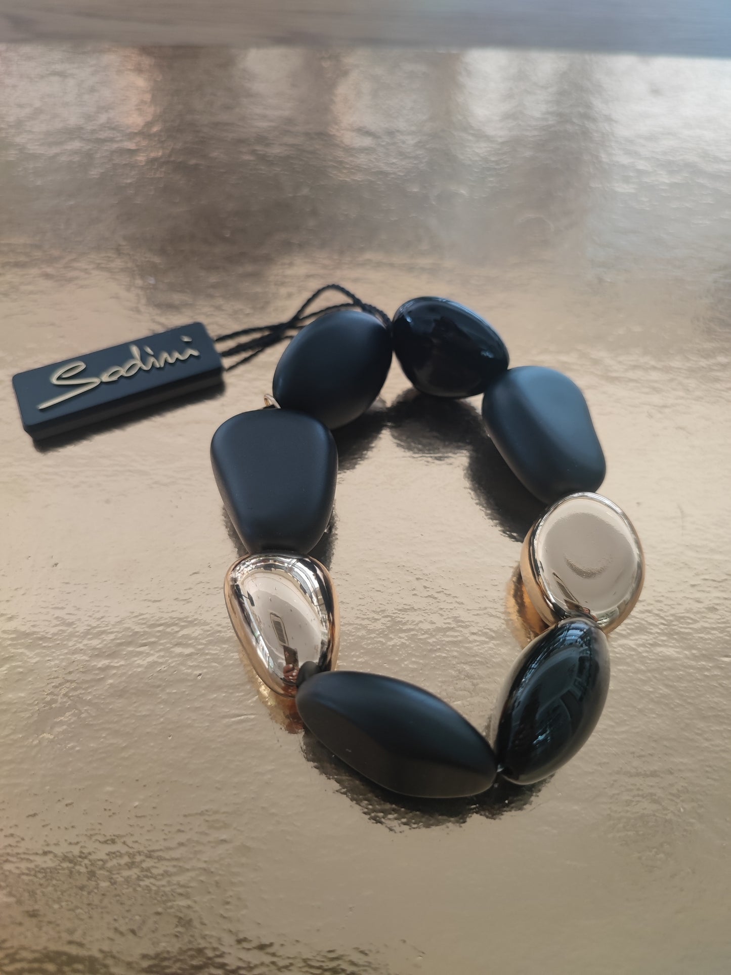 BRACCIALE SODINI ELASTICO NERO E ORO